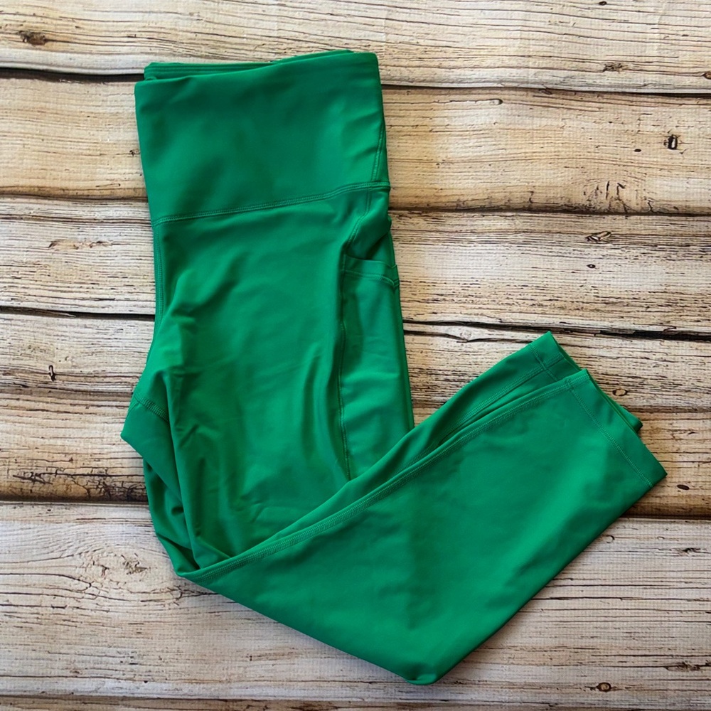 Athleta Green interval stash 7/8 legging size large